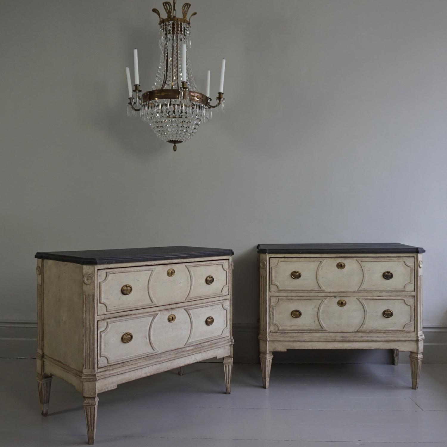 PAIR OF RICHLY CARVED GUSTAVIAN STYLE CHESTS