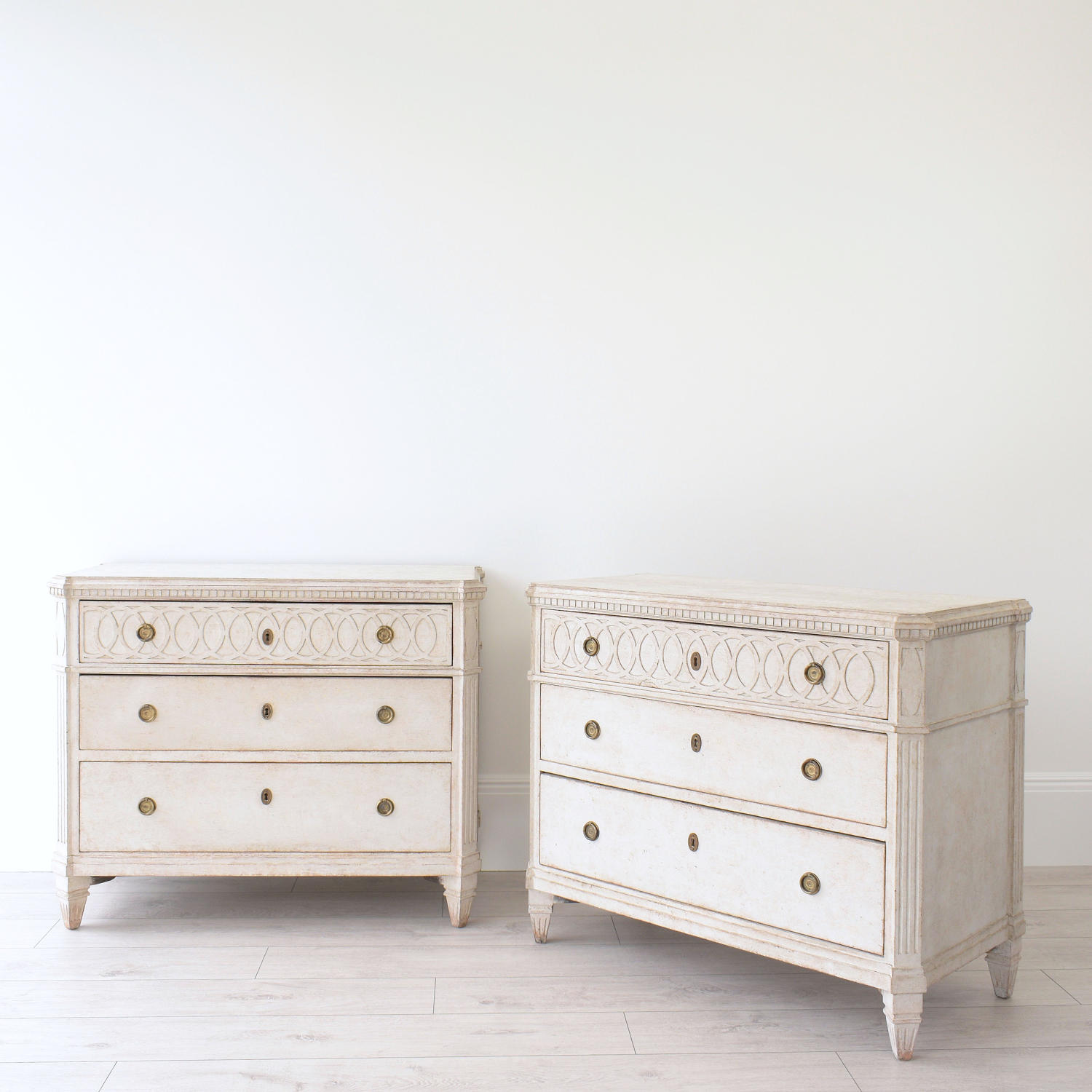 PAIR OF RICHLY CARVED GUSTAVIAN STYLE CHESTS
