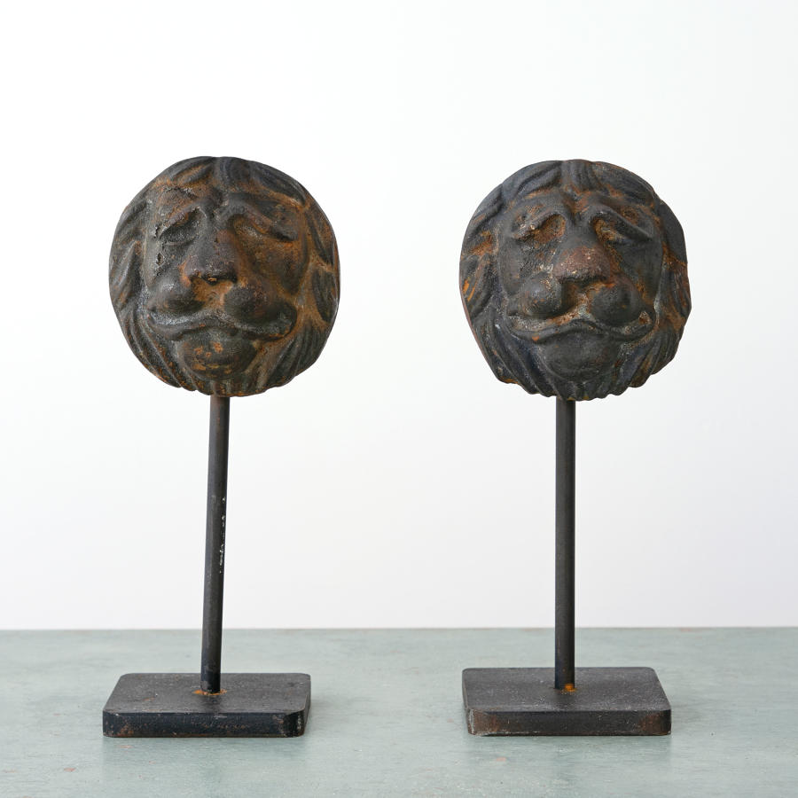 PAIR OF CAST IRON LIONS